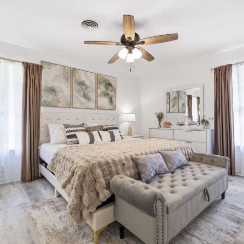Primary bedroom with king size bed.
