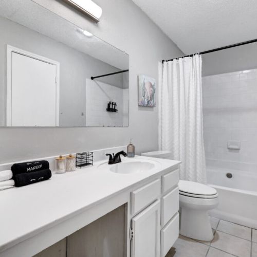 Primary bathroom is fully stocked with all you need. Makeup pads and q-tips included.