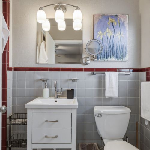 Primary bathroom is fully stocked with all you need. Makeup pads and q-tips included.