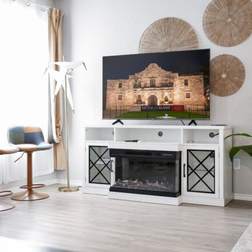 Cozy up by the electric fireplace.