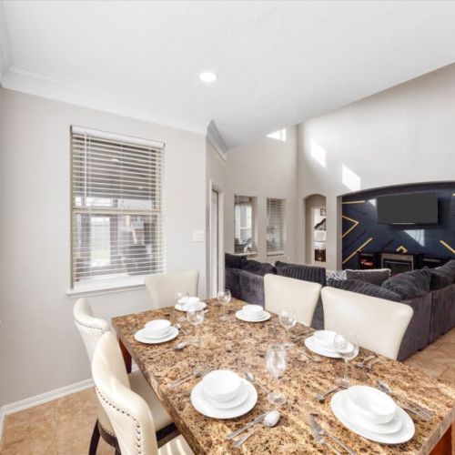 Charming 2nd dining area that sits 6, adjacent to kitchen and living room.