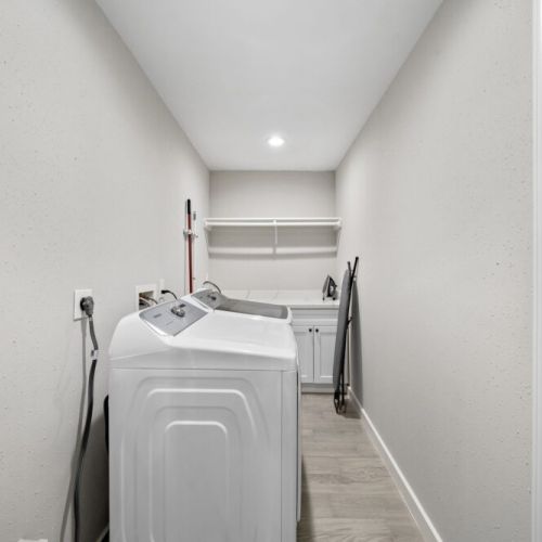 Fully-equipped laundry room.