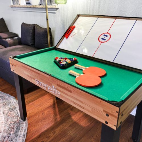 Game night just got better with our multi-game table. It includes foosball + pool + ping pong + air hockey