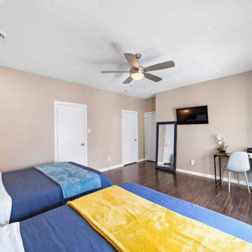 TVs included in all bedrooms. Desk and comfortable chair included.