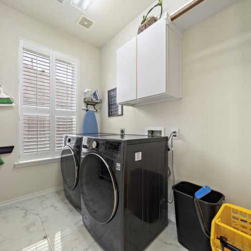Fully-equipped laundry room.