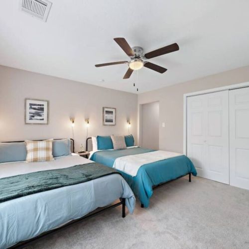 1st bedroom with two queen size beds! Super comfortable memory foam mattresses.