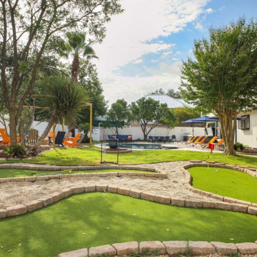 Enjoy a round of mini golf surrounded by the spacious backyard and resort-style amenities.