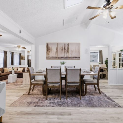 Spacious dining table that sits 6 with full tableware and silverware included.