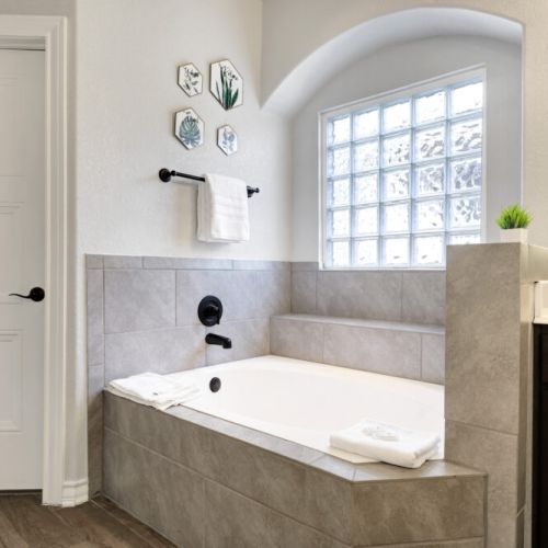 With luxurious standalone tub.