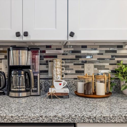 Coffee bar includes regular coffee, decaf, tea, sugar, cream, and sweetener.
