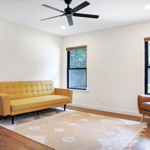 Additional area in primary room with seating area and twin size sofa bed