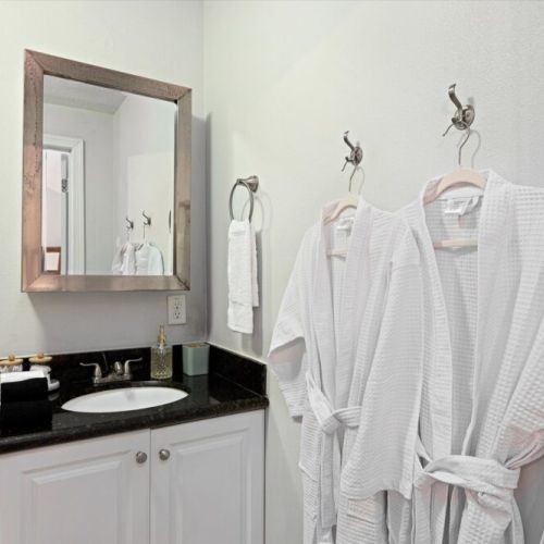 White robes and towels included.