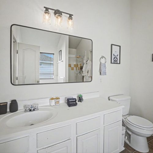 Primary bathroom is fully stocked with all you need. Makeup pads and q-tips included.