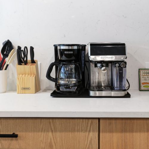 Coffee bar includes regular coffee, decaf, tea, sugar, cream, and sweetener.
