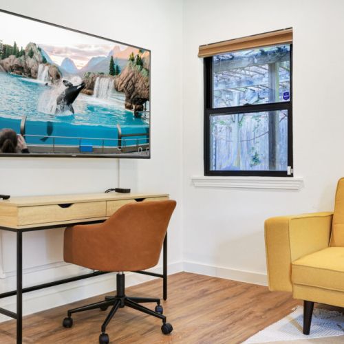 Smart TV with streaming channels! Desk and comfortable chair included.