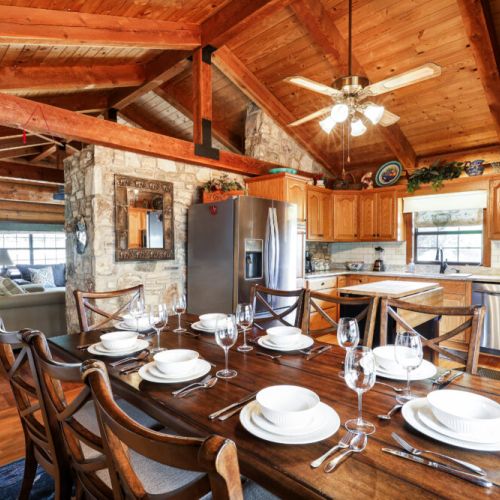 Spacious main dining table that sits 8 with full tableware and silverware included.