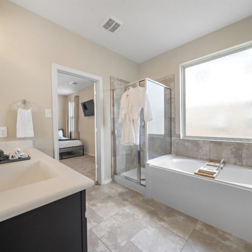 Pour yourself a glass of wine, sit back & relax! White robes included.