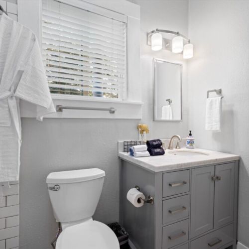 Primary bathroom is fully stocked with all you need. Makeup pads and q-tips included.