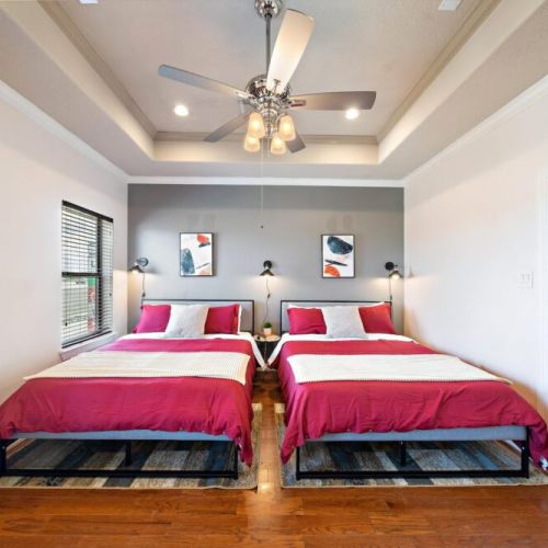 Primary bedroom with two queen size beds! Super comfortable memory foam mattresses.