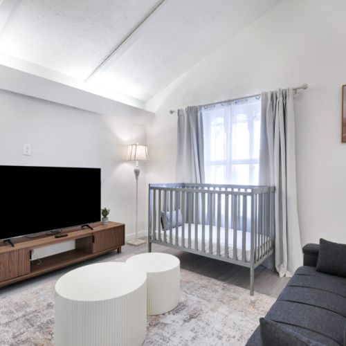 Large smart TV, twin sized futon and crib included for your family convenience.
