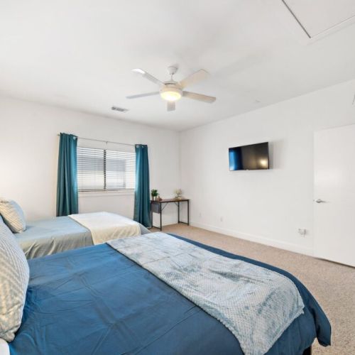 TVs included in all bedrooms. Desk and comfortable chair included.