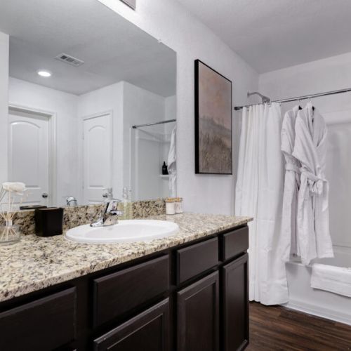 Primary bathroom is fully stocked with all you need. Makeup pads and q-tips included.
