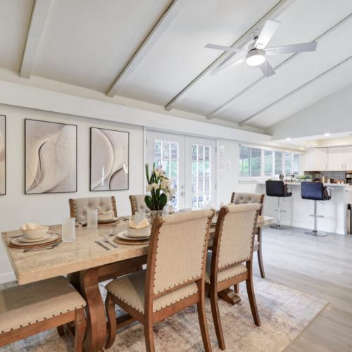 Dining area is conveniently close to the kitchen. Direct access to backyard.