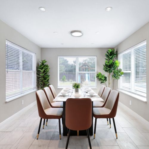 Spacious dining table that sits 8 with full tableware and silverware included.