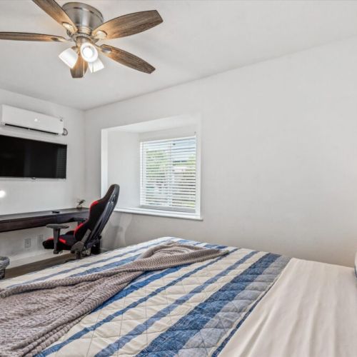Desk, gaming chair and smart TV included for your convenience.