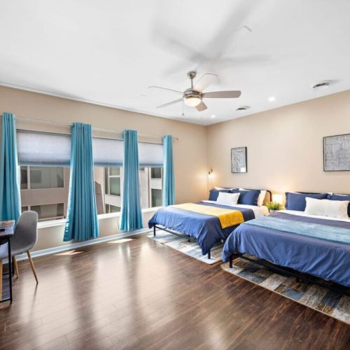 Primary bedroom with 2 queen size beds. Super comfortable memory foam mattresses.
