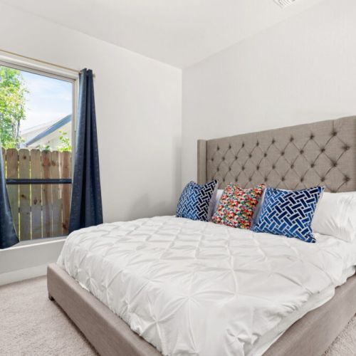 Primary bedroom with king size bed.