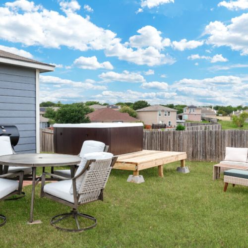 Outdoor dining area that sits 4 included for maximum comfort.