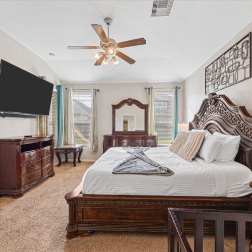 Smart TV, dressers and a crib included for your family convenience.