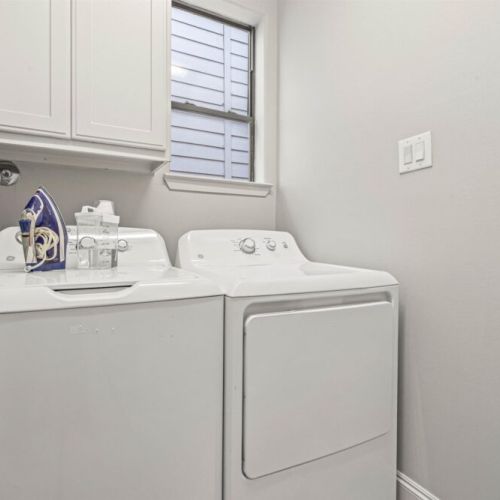 Fully-equipped laundry room.