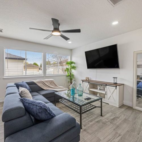 Large smart TV and full-length mirror  included.