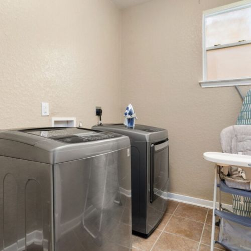 Fully-equipped laundry room.