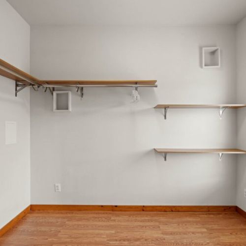 Fully equipped walk-in closet.